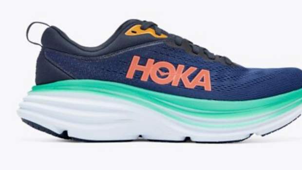 Navy, teal, and orange Hoka shoes.